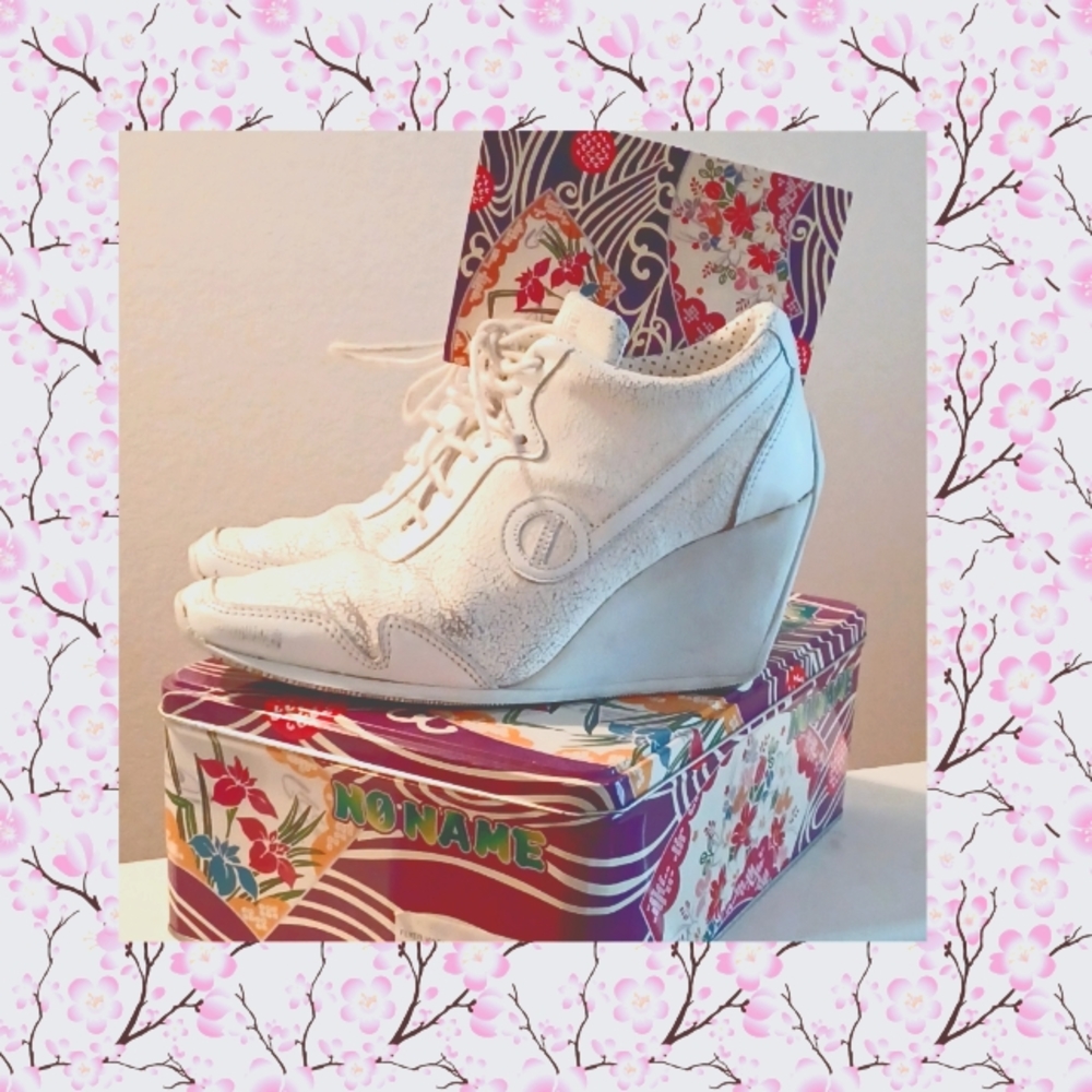 PRE-OWNED* IVORY CRACKED LEATHER WEDGE SNEAKER, BY NO NAME*